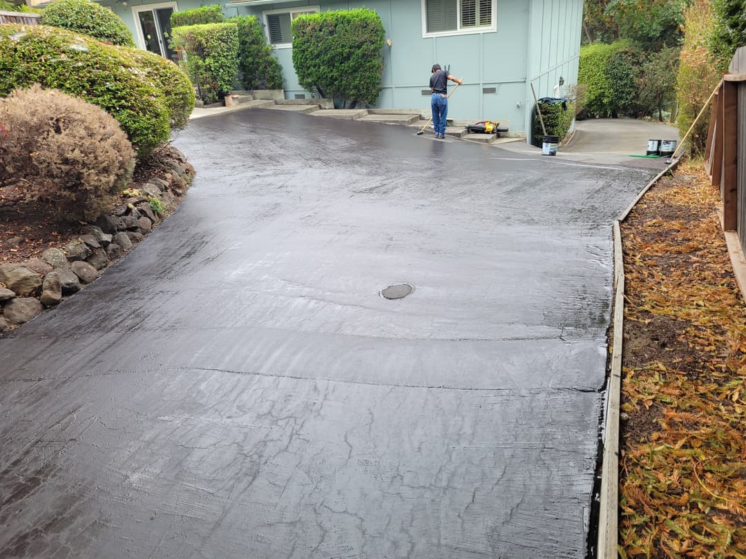 Patched asphalt driveway